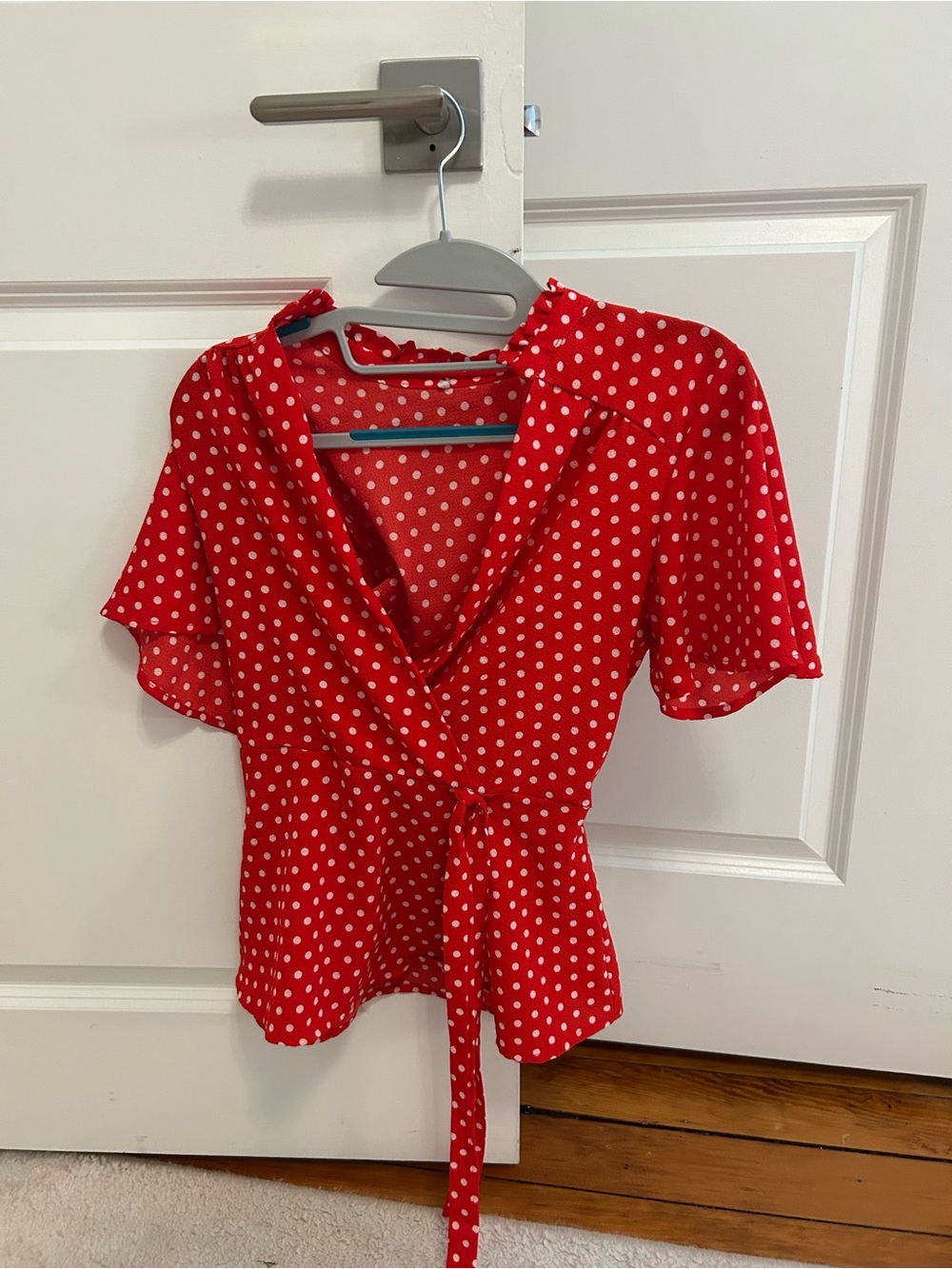 Red polka dot blouse